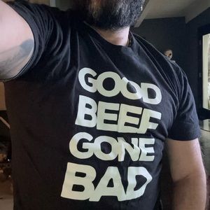 Sexy/Black/Tshirt. with the words: GOOD BEEF GONE BAD, EAGLE LA on back.